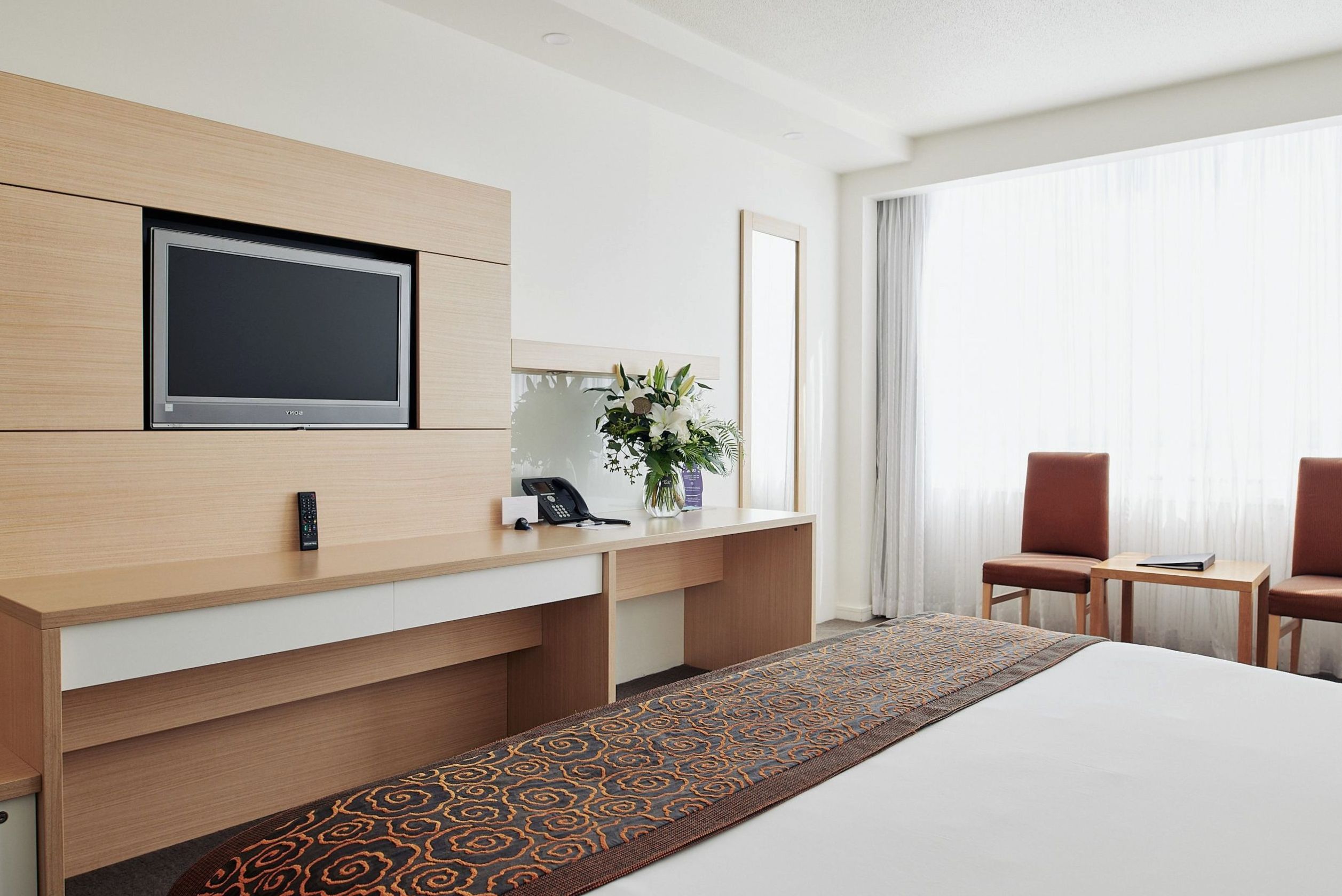 Resort Suite with separate living room and marina-facing balcony at The Ville